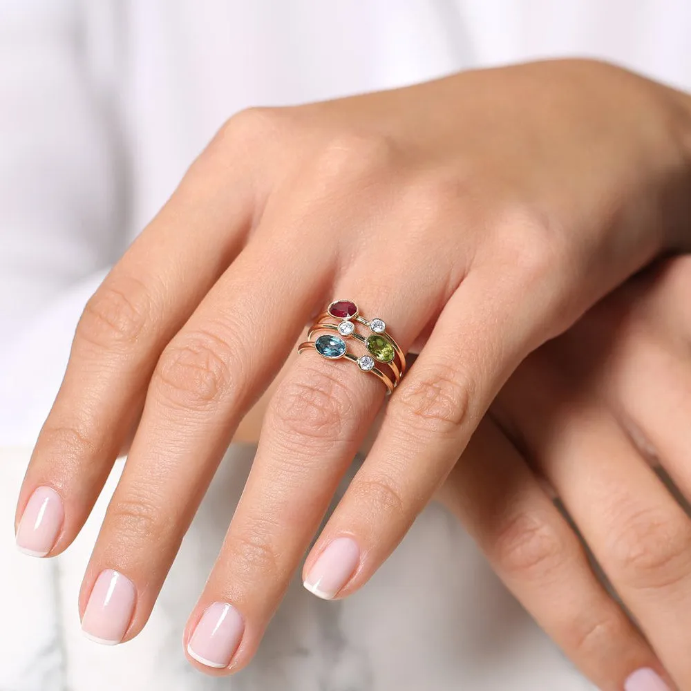 14k Gold Oval London Blue Topaz  and Diamond Ring