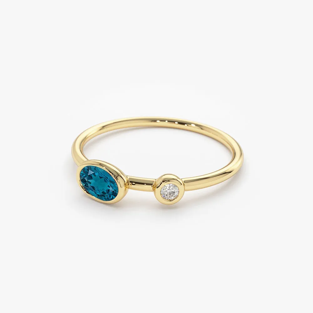 14k Gold Oval London Blue Topaz  and Diamond Ring