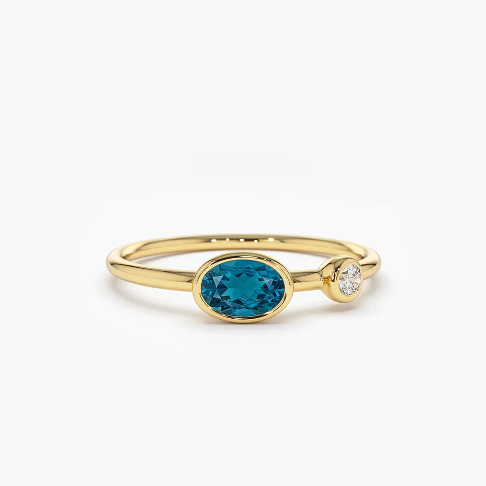14k Gold Oval London Blue Topaz  and Diamond Ring