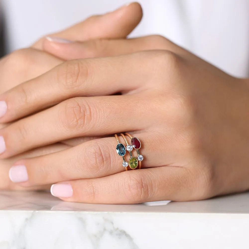 14k Gold Oval London Blue Topaz  and Diamond Ring