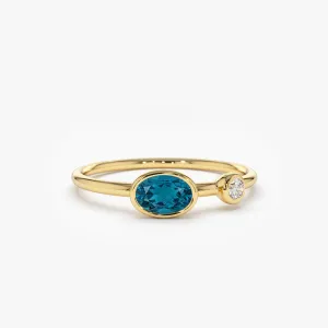 14k Gold Oval London Blue Topaz  and Diamond Ring