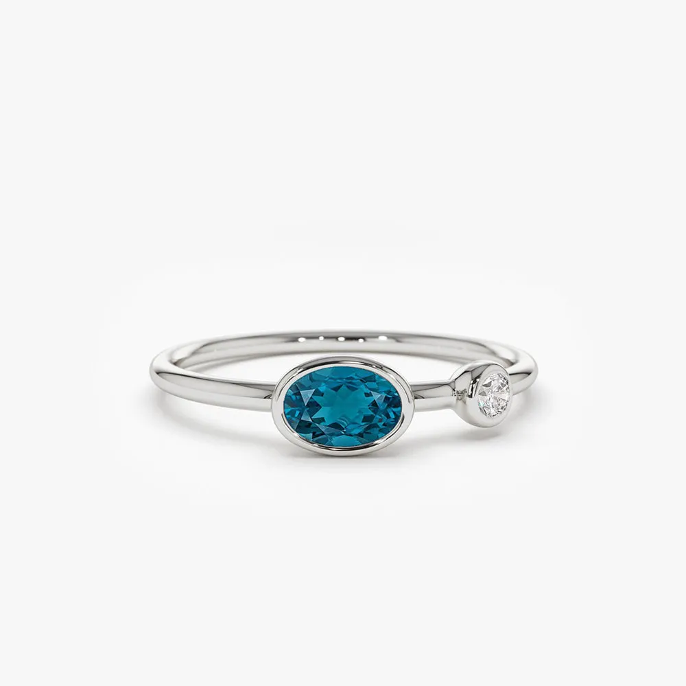 14k Gold Oval London Blue Topaz  and Diamond Ring