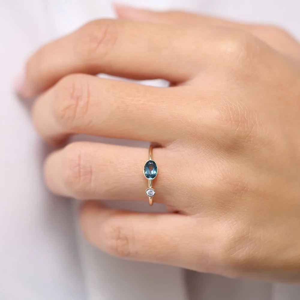 14k Gold Oval London Blue Topaz  and Diamond Ring