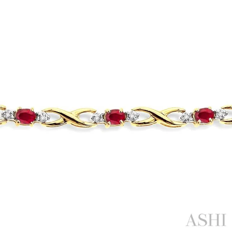 4x3mm Oval Cut Ruby and 1/10 Ctw Single Cut Diamond Bracelet in 14K Yellow Gold