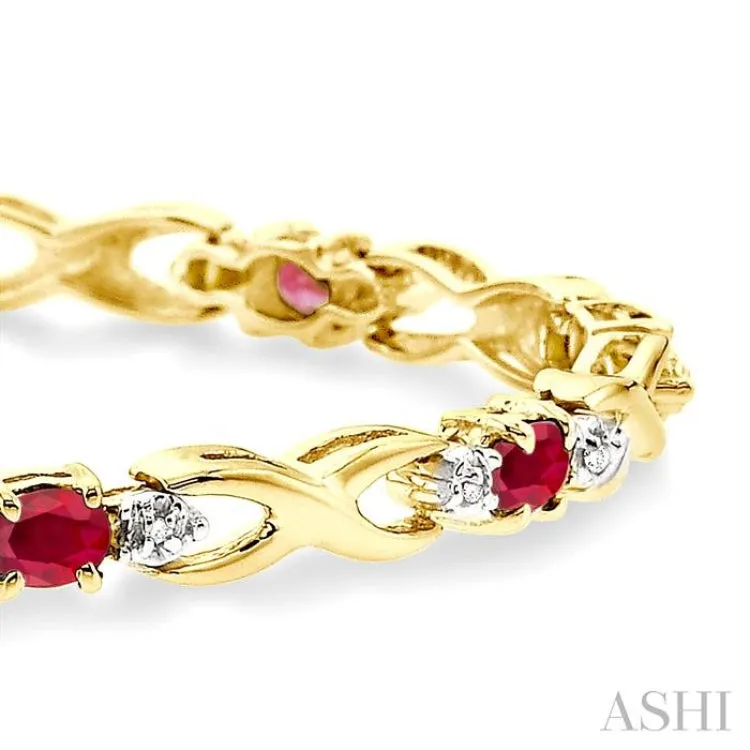 4x3mm Oval Cut Ruby and 1/10 Ctw Single Cut Diamond Bracelet in 14K Yellow Gold