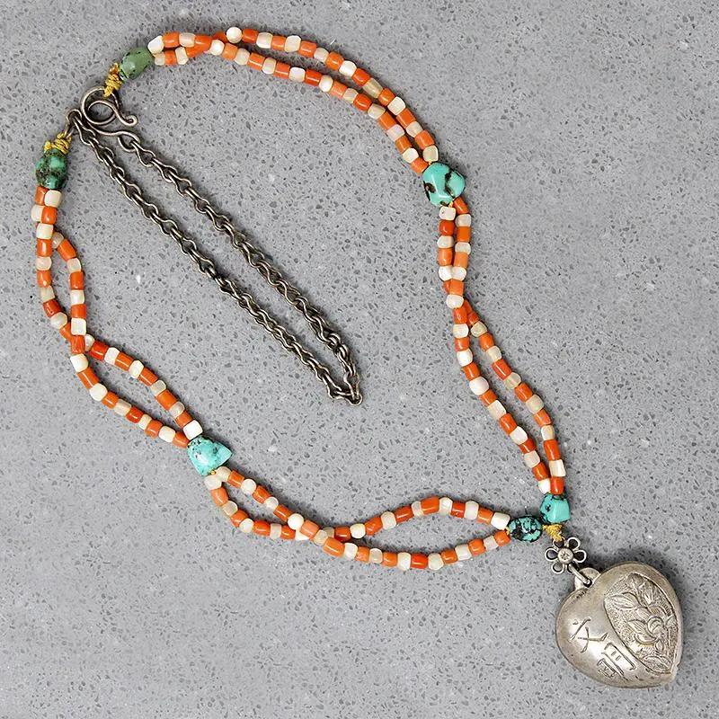 Chinese Repoussé Silver Heart Pendant on Beads