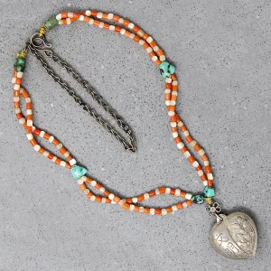 Chinese Repoussé Silver Heart Pendant on Beads