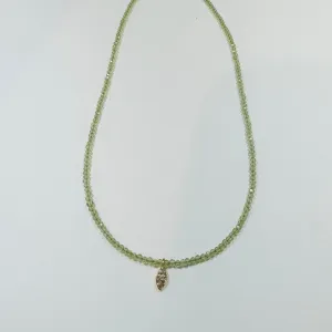 delicate peridot necklace with diamond charm