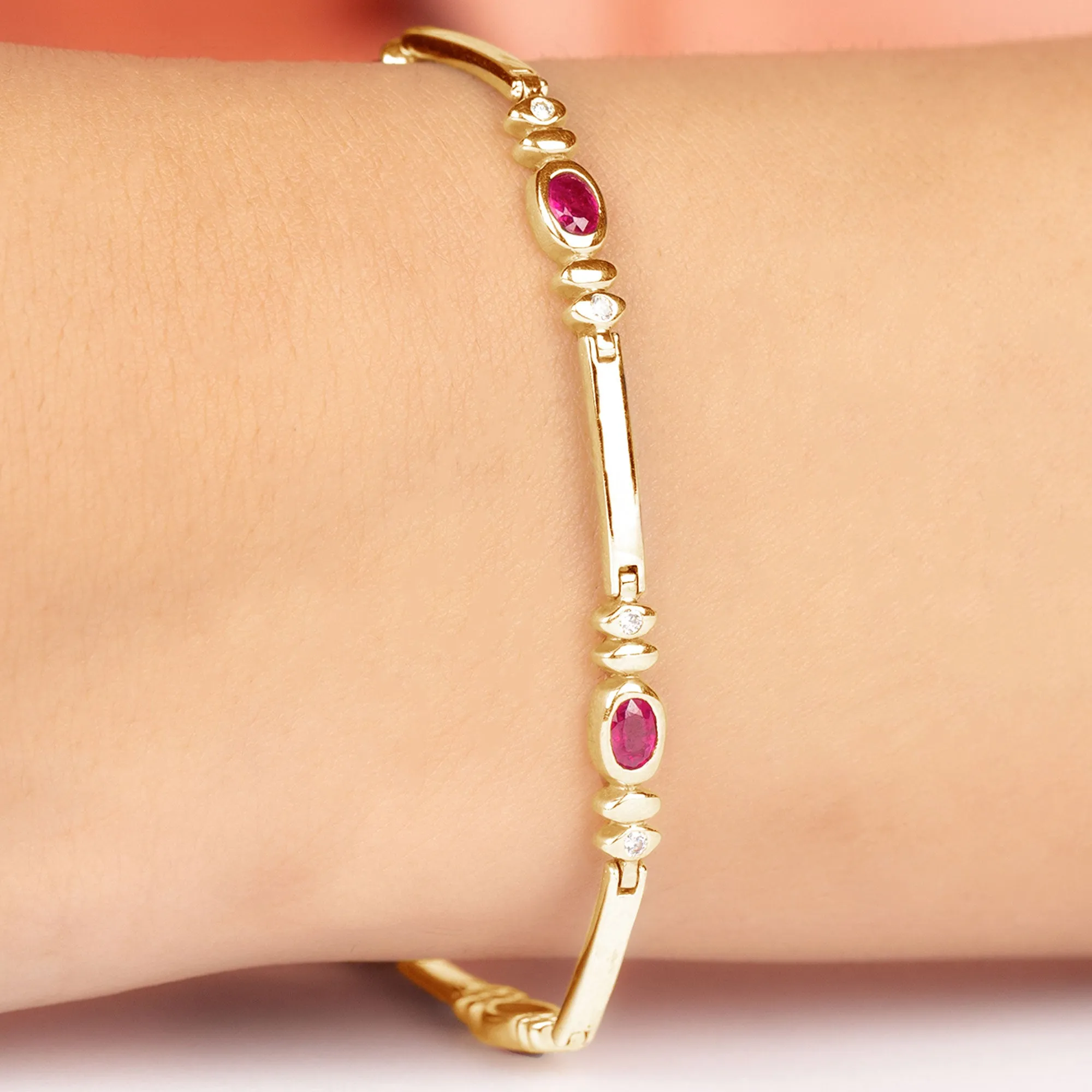 Oval Lab Grown Ruby Link Bracelet with Moissanite