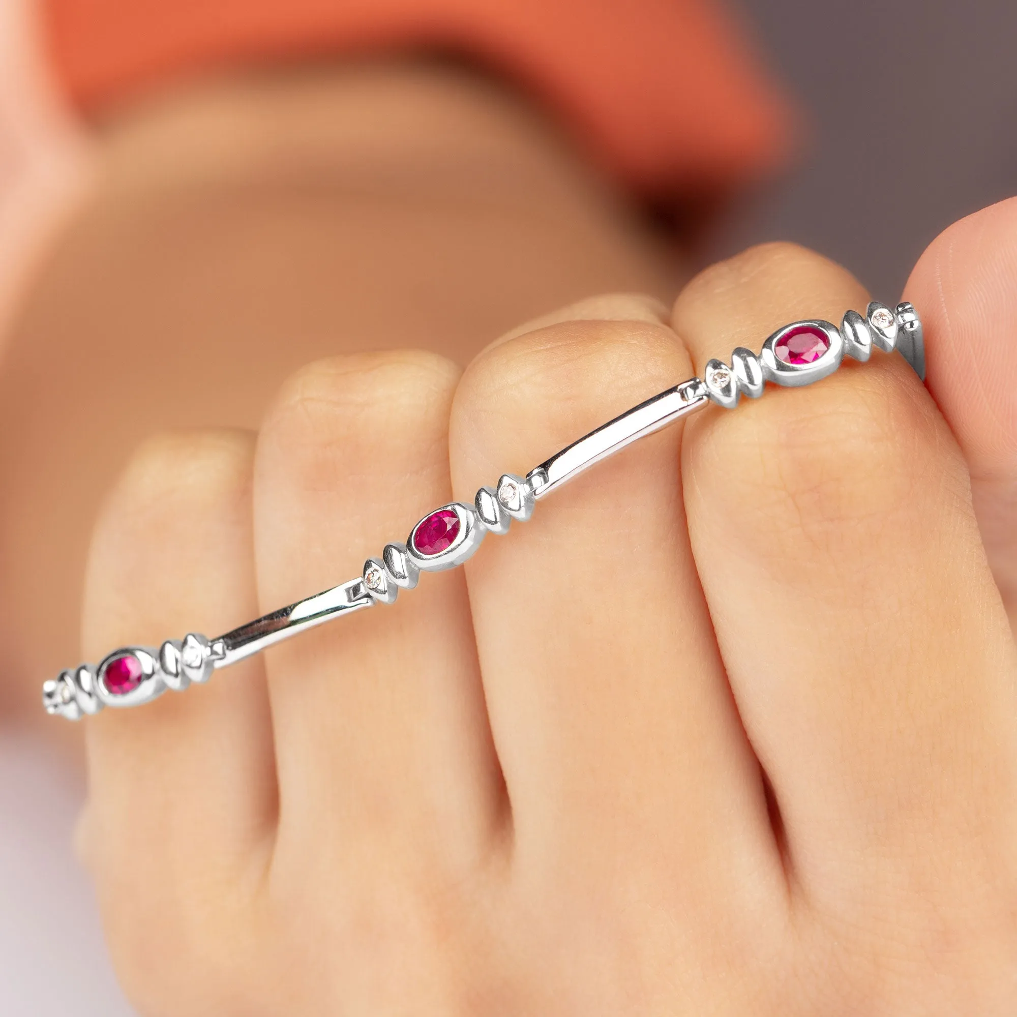 Oval Lab Grown Ruby Link Bracelet with Moissanite