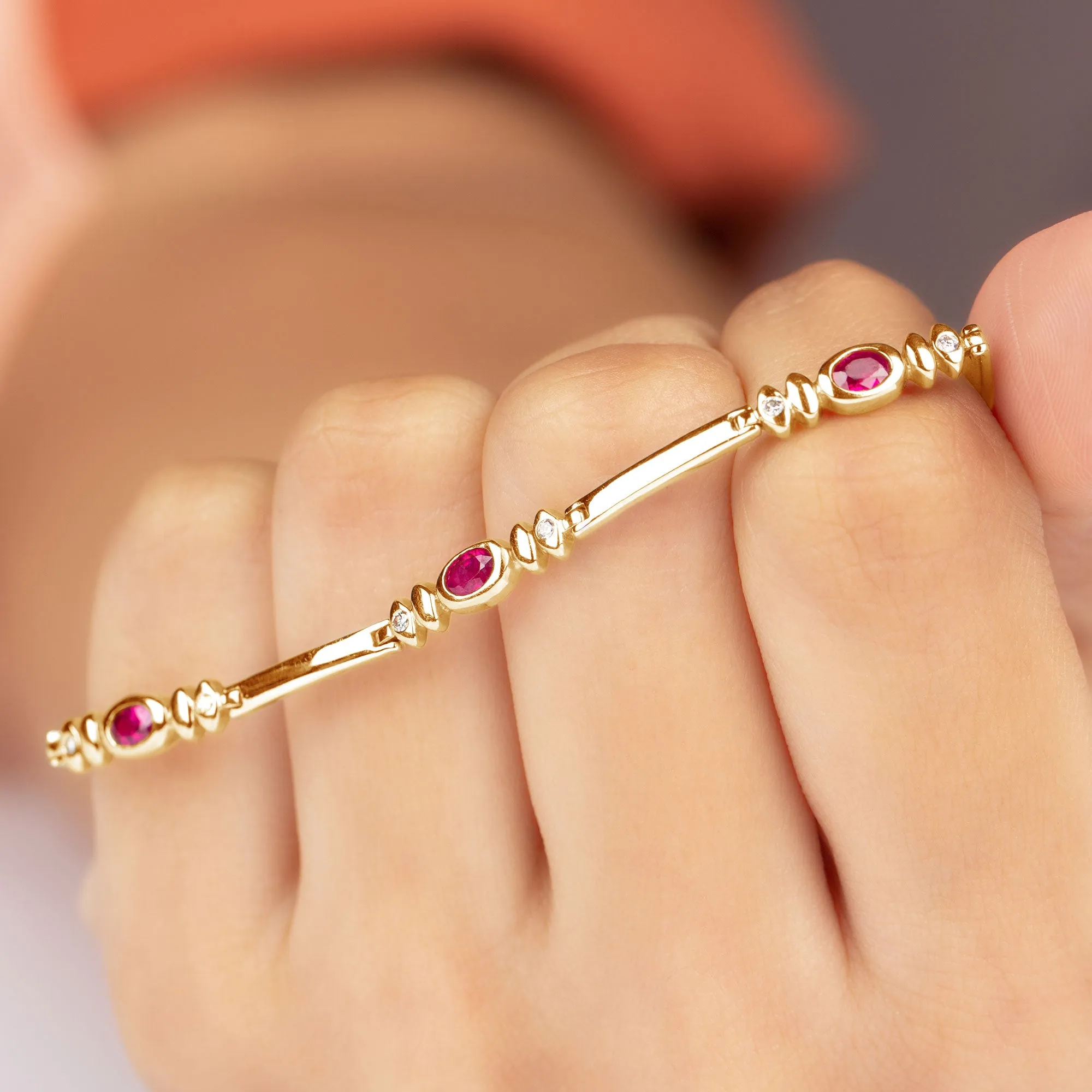 Oval Lab Grown Ruby Link Bracelet with Moissanite