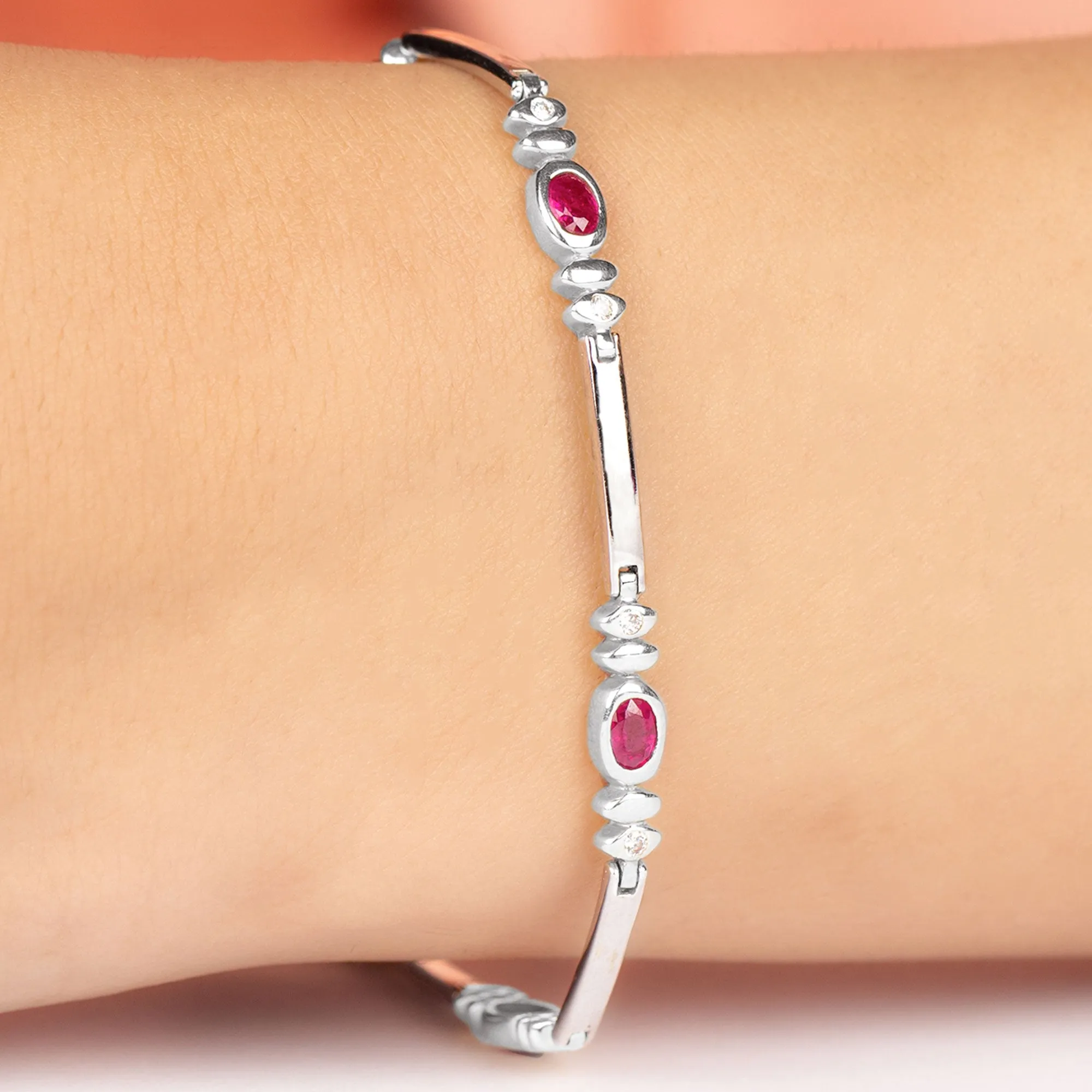 Oval Lab Grown Ruby Link Bracelet with Moissanite