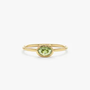Oval Peridot Ring In Solid Gold, Linda