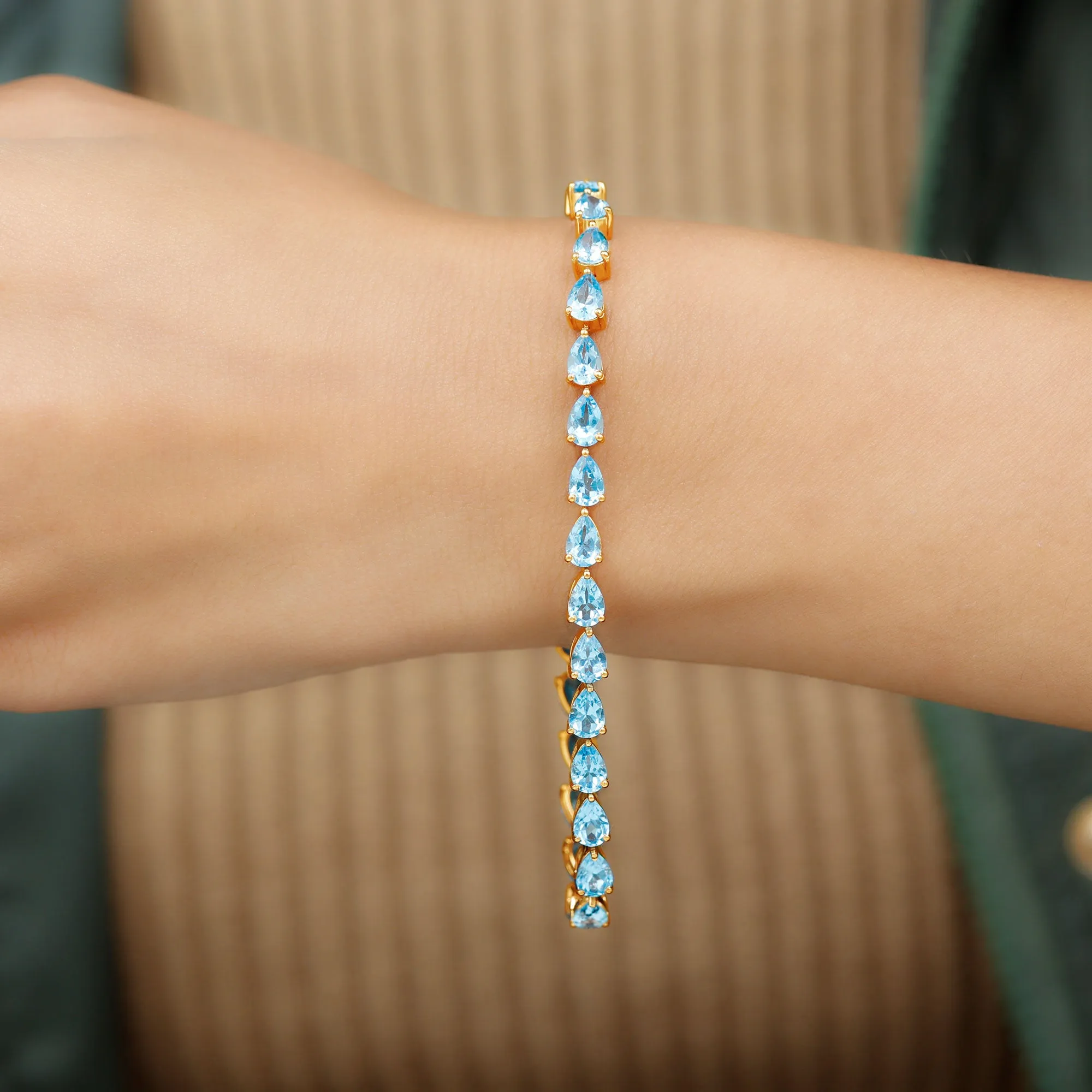 Pear Cut Swiss Blue Topaz East West Tennis Bracelet