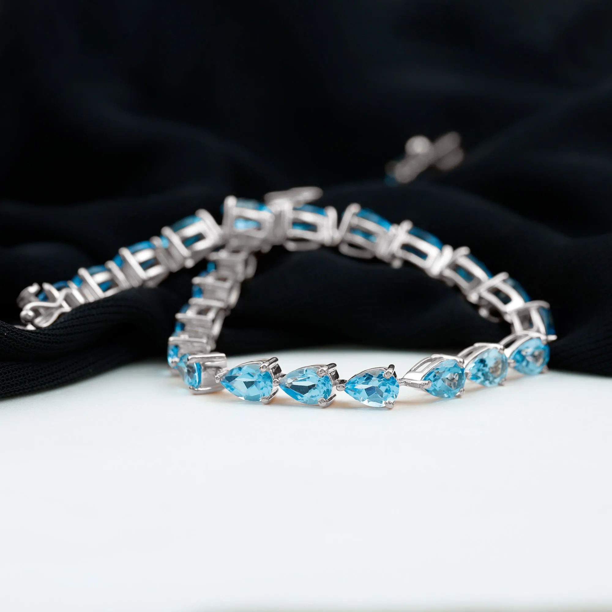 Pear Cut Swiss Blue Topaz East West Tennis Bracelet