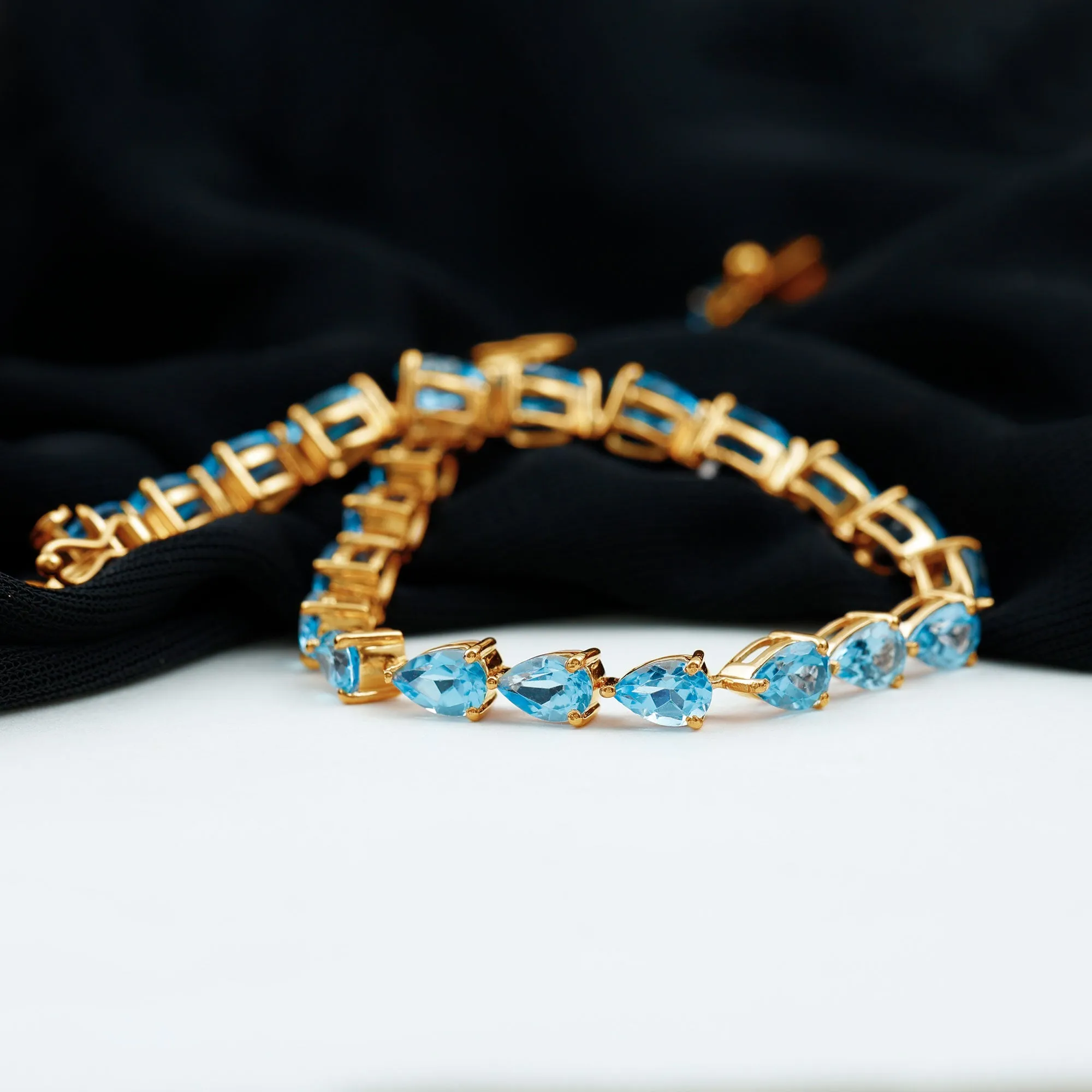 Pear Cut Swiss Blue Topaz East West Tennis Bracelet