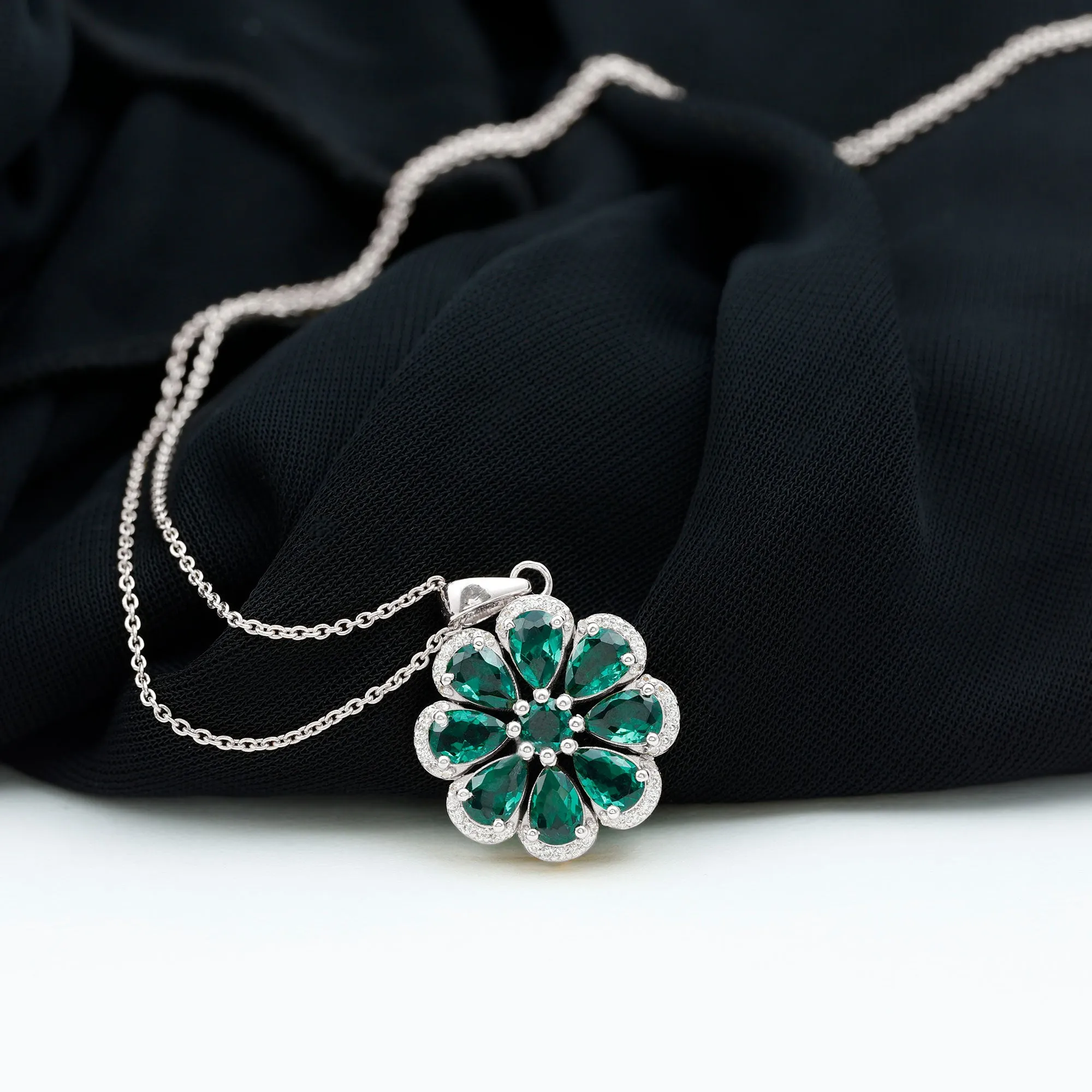 Pear Shape Created Emerald Flower Pendant with Moissanite