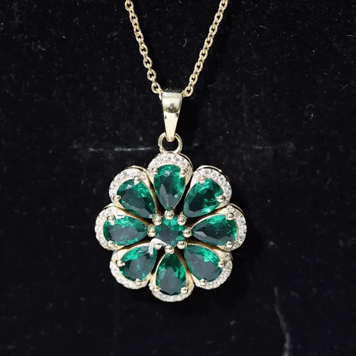 Pear Shape Created Emerald Flower Pendant with Moissanite