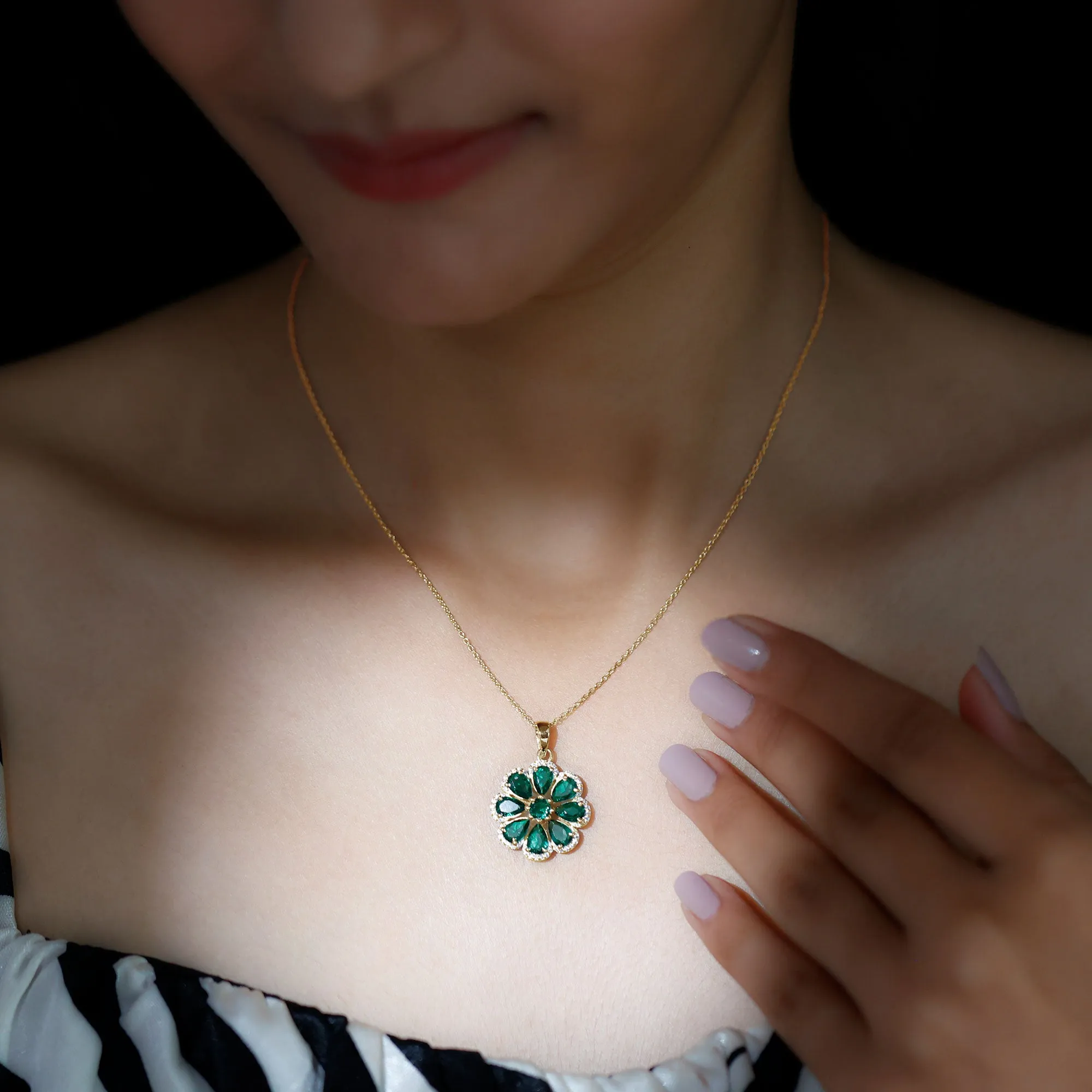 Pear Shape Created Emerald Flower Pendant with Moissanite