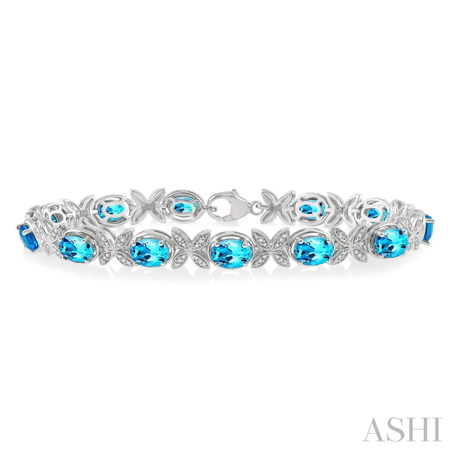Sterling Silver Round Cut Diamond and Oval Cut Blue Topaz Bracelet